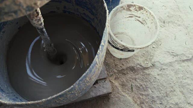 Clay Mud Swirling in an Industrial Ceramic Studio Mixer