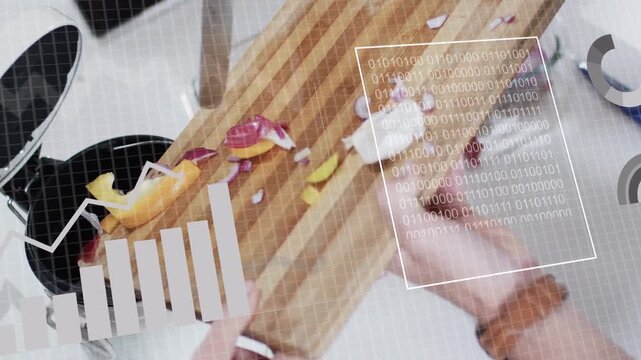 Man chopping veg for cooking while woman tilting board guiding into black pan, HUD framing hands