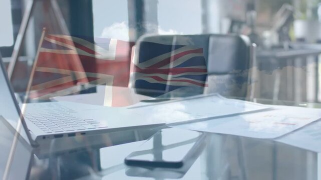 Left flag appearing, faint UK flag sweeping over glass workspace, shifting glare showing branding
