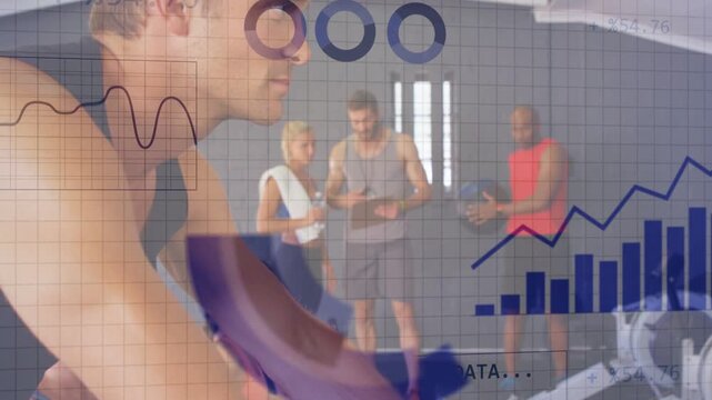 Male athlete using fitness machine sending data coaches checking tablet overlaying graphs analyzing