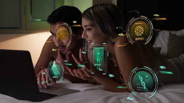 Man typing on laptop, woman holding phone on bed, activating AR DNA or brain icons for health, smili