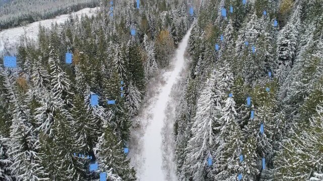 Camera pulling back and tilting showing thin snow trail while blue bars expanding revealing valley