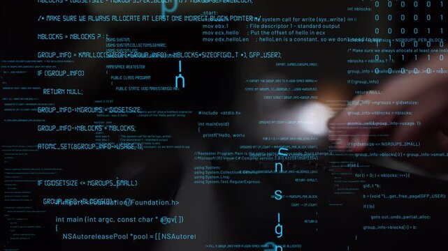 A focused coding environment featuring hands typing on a keyboard surrounded by digital lines of code. This image highlights the essence of technology and programming. Xenic