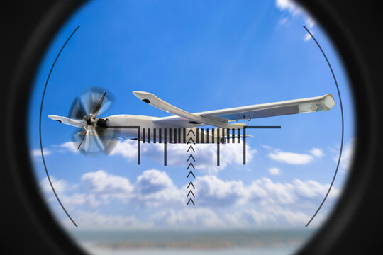 Military surveillance, reconnaissance drone targeted through optical sight, UAV patrols sky, aerial monitoring, defense technology and border security operations