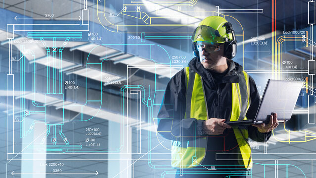 Industrial engineering, specialist reviews HVAC system schematics on laptop, ventilation planning, infrastructure design and facility optimization in factory building