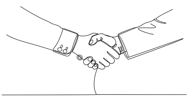 Two people shaking hands in agreement.