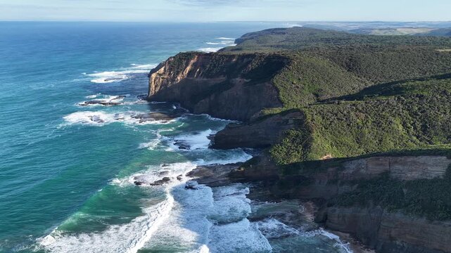 The Gables, Moonlight Head Rd, Gellibrand Lower, Victoria, Australia: 4K aerial drone footage of dramatic cliffs, ocean waves, rugged coastline and coastal forest in Great Otway National Park