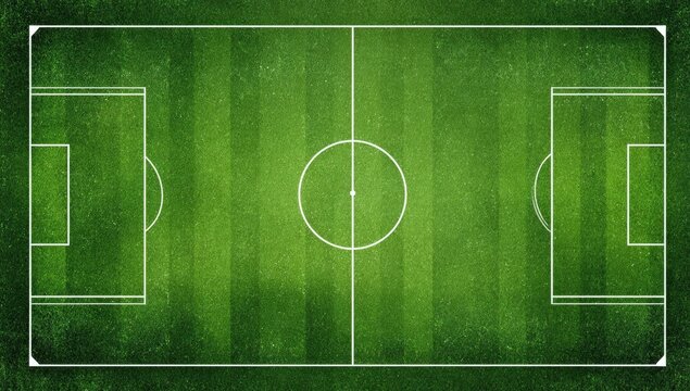 An aerial view showcases a perfectly maintained green soccer field with clearly marked lines.
