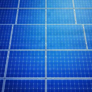 Top-down view of blue photovoltaic panels arranged in a minimalist grid pattern, highlighting symmetry and renewable energy technology, blue, lines, array