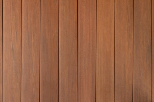 Wood wall background and texture. Brown textured wall background. Brown wood texture wallpaper. Wood construction background for design projects.