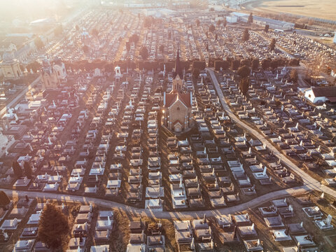 Drone view of the Catholic church and cemetery on the sunrise. Sombor, Serbia, Europe