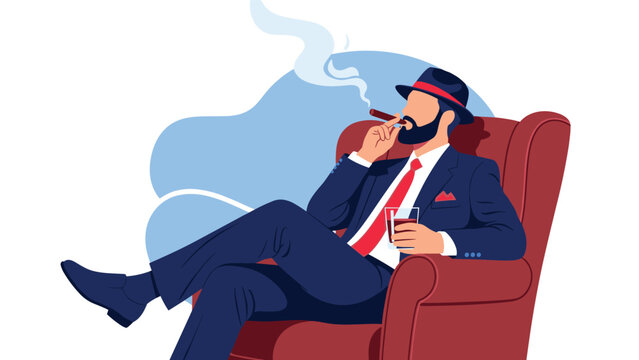Elegant bearded man in a blue suit sits in a red armchair while smoking a cigar and holding a glass of whiskey.