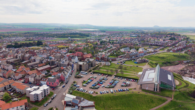 Aerial view over Dunbar townscape featuring traditional residential housing and historic urban architecture in East Lothian Scotland