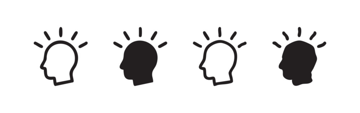 Four hand-drawn head with lightbulb icons, two outlines, two solid black, on white background