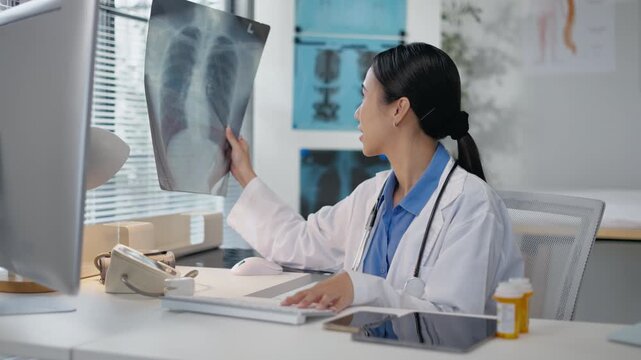 Asian female doctor using a smartphone in a hospital,interacting with a virtual assistant or AI chatbot.doctor reviews health data via ai agent,smart mirror technology,future technology
