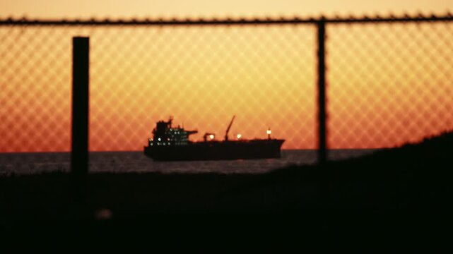 Tanker anchoring on the Pacific Ocean at sunset