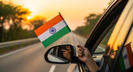 Fototapeta premium Celebrating freedom a vibrant india flag waving on independence day during a scenic sunset drive