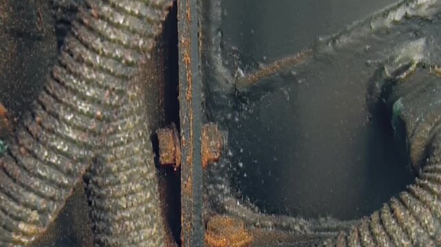 This close examination reveals the intricate details of a heavily soiled air filter component.