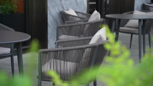 Outdoor Garden Patio With Garden Furnitures, Coffee Table, Parasol And Plants