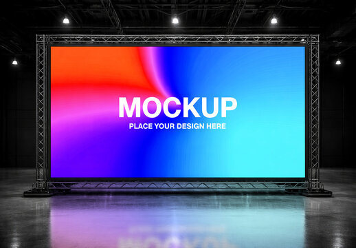 Large Backdrop Screen Mockup with Metal Truss Frame in Dark Event Hall or Studio