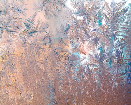 Digital photo of ice crystal patterns on window winter abstract