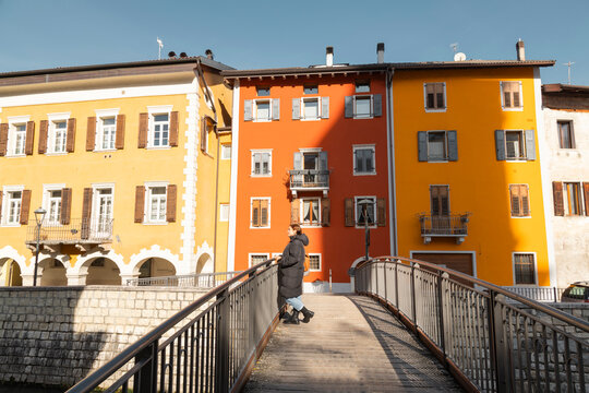 Winter view of colorful buildings in Borgo Valsugana