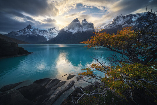 Dramatic sunrise over Los Cuernos and lake in Patagonia