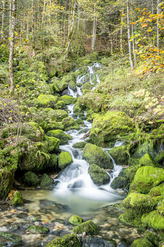 Long exposure waterfall and stream in Lods forest, France