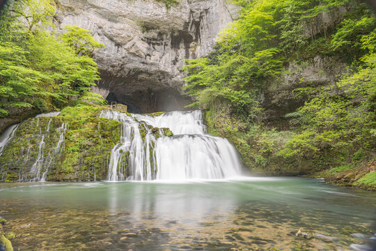 Long exposure waterfall and river pool in Lods, France