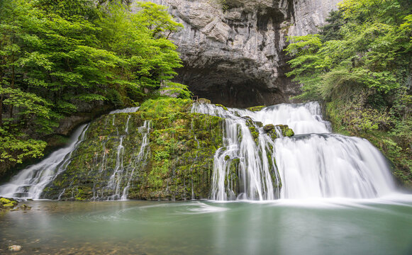Long exposure waterfall and river pool in Lods, France