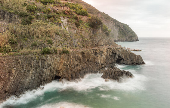 Long exposure sea on rocky coast in Lods, France