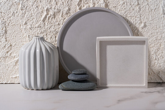 Modern concrete and ceramic cosmetics display setup