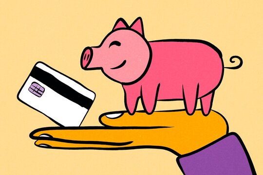 Business innovation concept with piggy bank and credit card