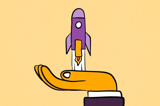 Hand launching rocket as business innovation startup concept