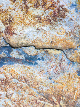 Abstract stone texture with natural crack and rust stain