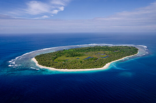 Aerial view of Snake Island reef and lagoon near Kandui