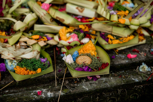 Balinese canang sari offering with flowers in Tegalalang
