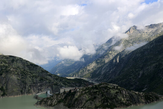 View of the Grimsel reservoir with the dam at the Grimsel Pass in the Swiss Alps