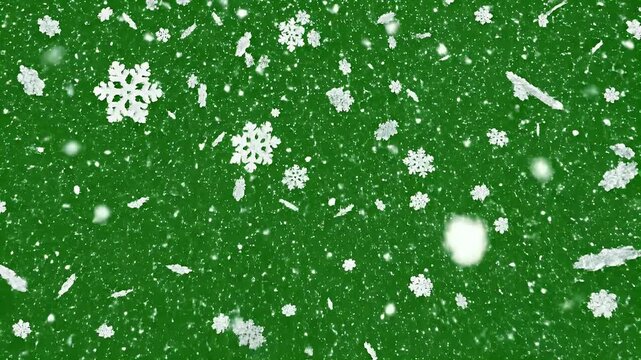A vibrant green background is delicately adorned with scattered white snowflakes, creating a festive and wintry visual texture.