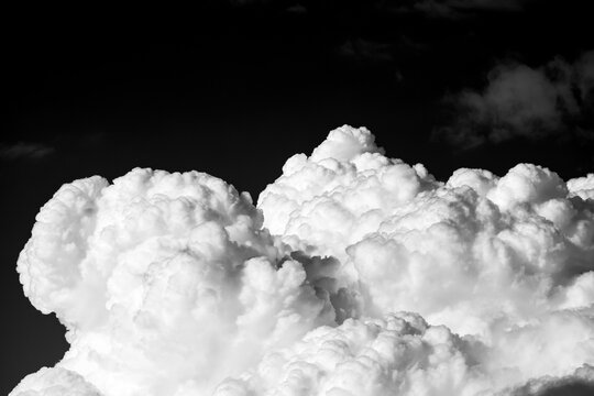 Dramatic black and white cloud formations in stormy sky