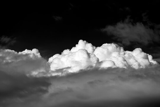 Majestic cloud formations in dramatic monochrome sky