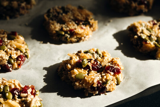 Homemade sugar-free seed cookies on baking tray closeup