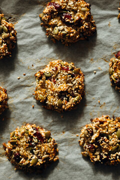 Homemade sugar free seed cookies on baking paper flat lay