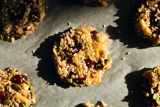 Homemade no sugar seed cookies on baking paper top view