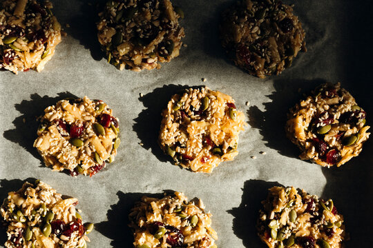 Homemade no sugar seed cookies on baking paper top view