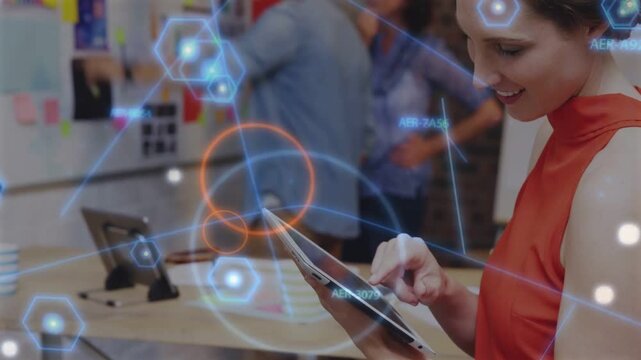 Woman tapping tablet, causing AR HUD pulsing over whiteboard and team rearranging notes for design