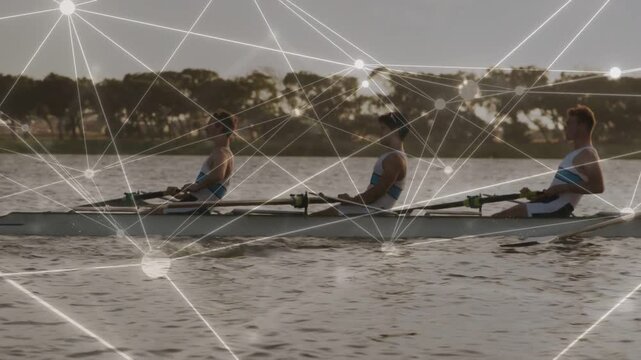 Drive starting stroke as four rowers driving shell with oars on river for training, network fixed