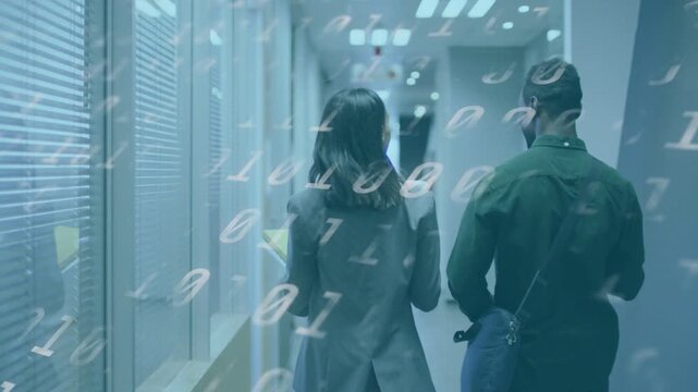 Staff exiting corridor talking tech work while holding tablet and coffee binary overlay on tablet