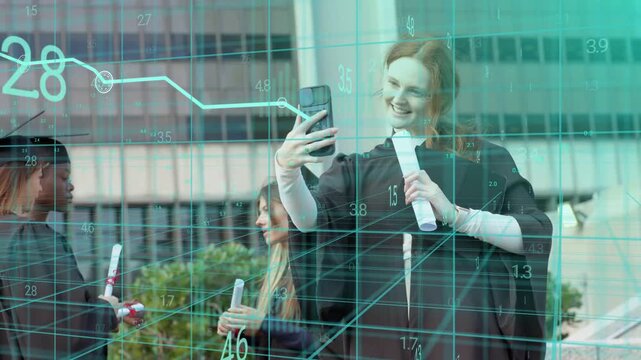 lead grad taking selfie, peers with diplomas, teal grid overlaying faces marking graduation