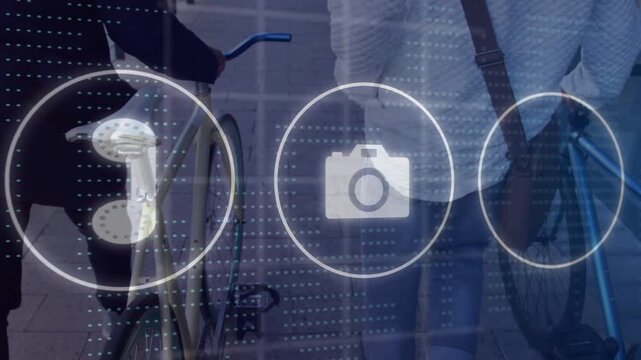 Two men walking with bicycles on promenade, highlight appearing over bag and animating tech icons